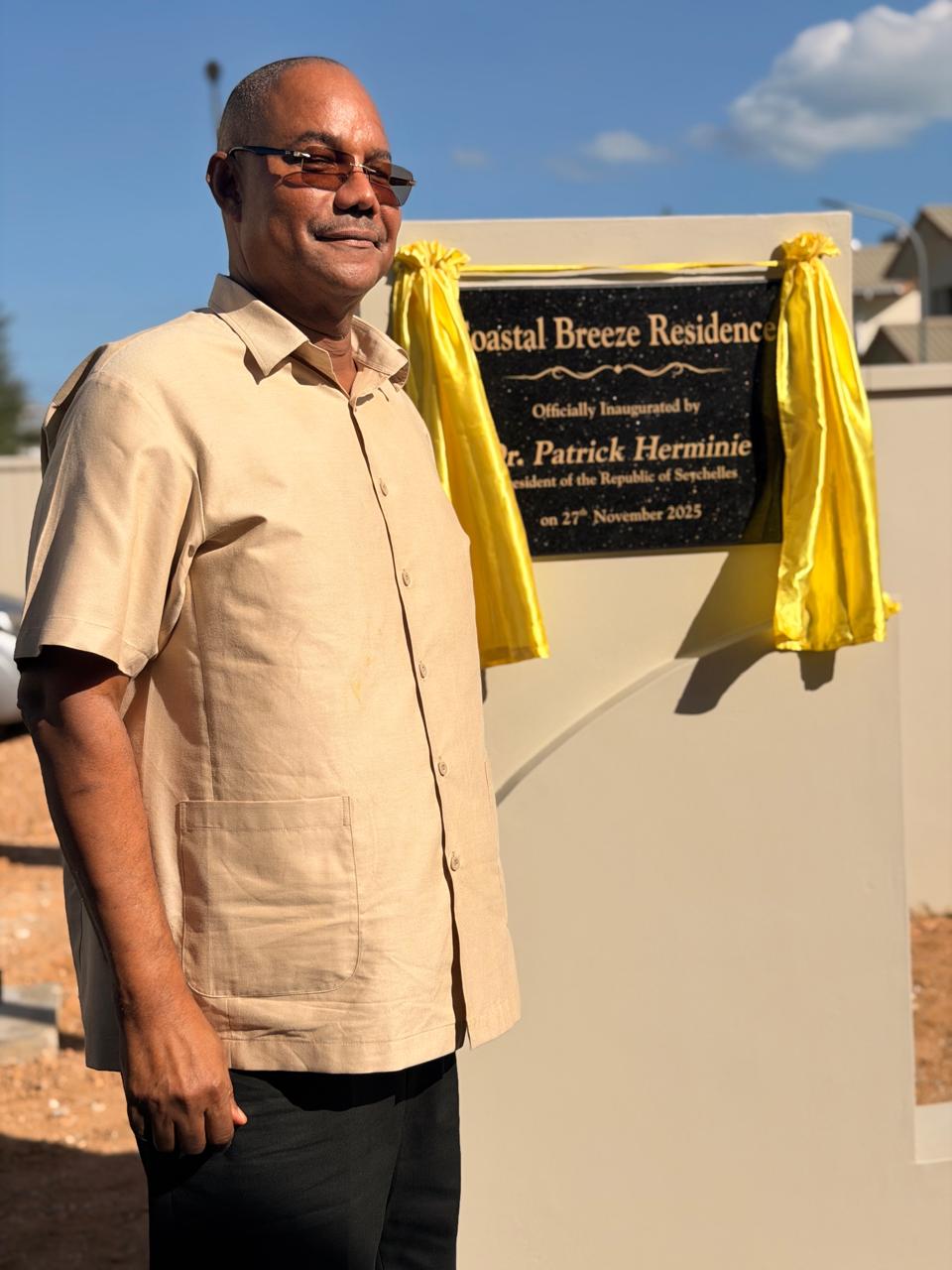 32 families receive keys to their new mid-range condominiums at Perseverance.